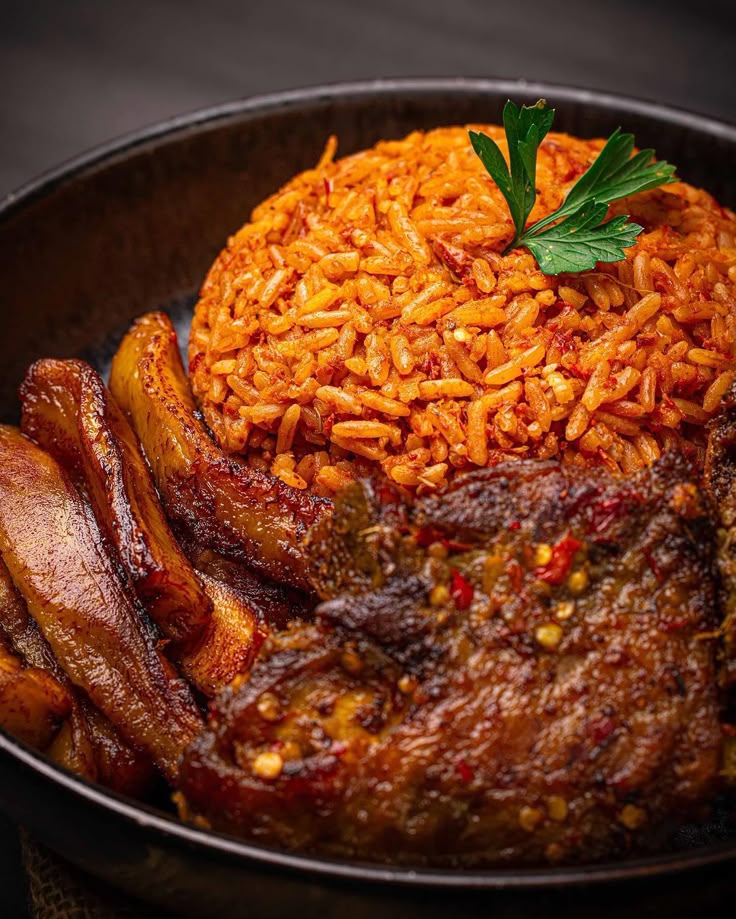 Jollof Rice, plantain, and chicken 
